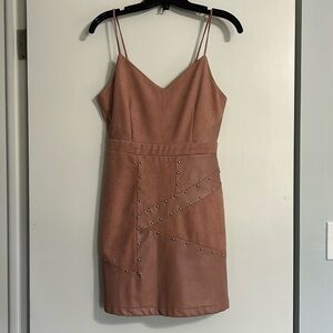 Pink faux suede and faux leather dress with silver studs. Zipper in the back.